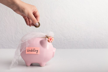 Save money for wedding with piggy bank concept