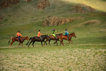 Mongolian horse race during Naadam festival in western Mongolia. Naadam is inscribed on the List of...
