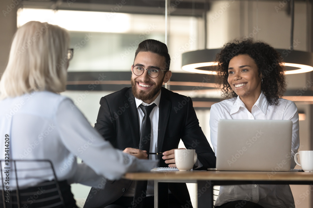 Sticker Arabian and african ethnicity HR managers interviewing elderly female