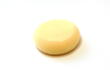 Disposable foundation make-up sponge isolated on white background