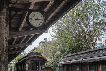 Fototapeta na wymiar old clock in railway station platform