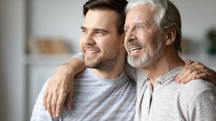 Dreamy positive two male generations family planning future.