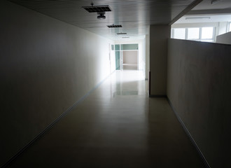 Light at the exit of the corridor in the building