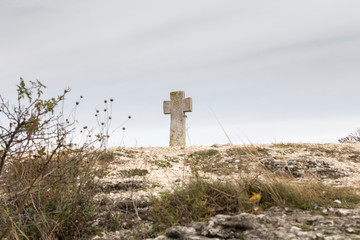 Stone Cross and six-pointed Lotus.