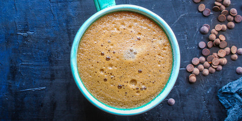 coffee drink and coffee grain, hot chocolate. top view. copy space