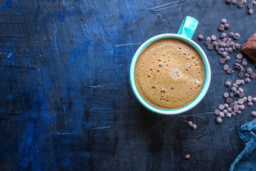coffee drink and coffee grain, hot chocolate. top view. copy space