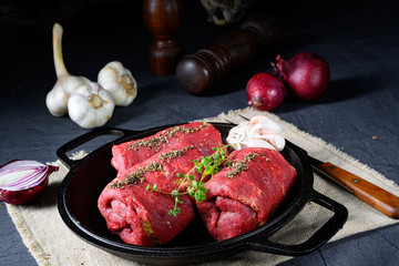 raw beef roulades prepared for cooking