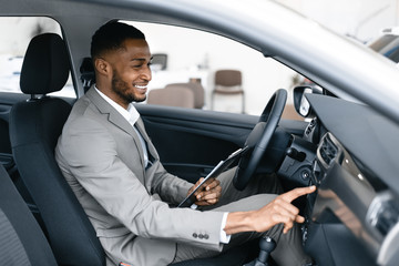 Insurance Agent Man Checking Vehicle Taking Notes Sitting In Automobile