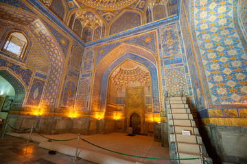 Fototapeta na wymiar The interior of the mosque in the Tilla-Kari Madrasah on the Registan square, Samarkand, Uzbekistan
