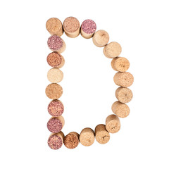 The letter "D" is made of wine corks. Isolated on white background