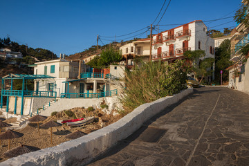 Fototapeta na wymiar whitewashed houses in the enchanting coastal village of Armenistis on the Greek Island of Ikaria