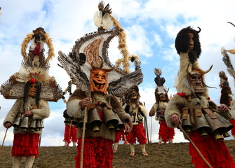 Elin Pelin, Bulgaria - February 15, 2020: Masquerade festival in Elin Pelin, Bulgaria. People with...