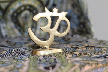 Figure of golden indian symbol aum.