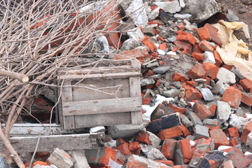 Construction waste with elements of various dismantled and destroyed old structures at municipal landfill