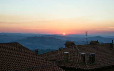 Panoramic view from the roof in San Marino in Italy in the evening at the sunset