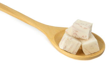 Sweet taro root, Satoimo potatoes or cube of taro root (Yautia Lila) isolated on white background