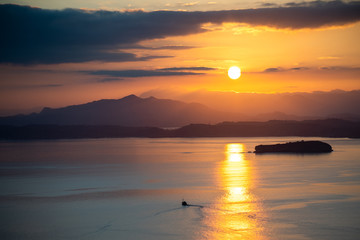 sunset over the sea in the mountains