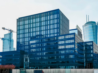 Naklejka na ściany i meble New modern business center in Warsaw, construction of a glass stylish building