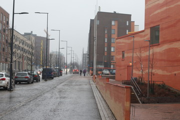Urban Scandinavian city with foggy weather