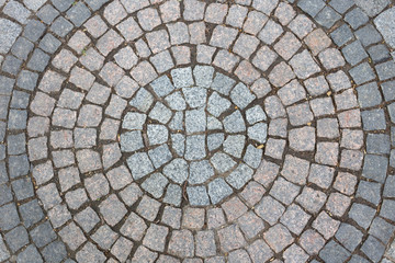 Paving blocks is like the sun as a background.