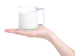 glass mug cup with milk in hand on white background isolation