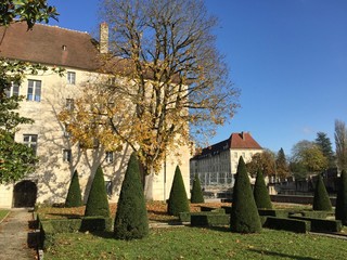 The Hôtel-Dieu building and park in Dole's old town, France.