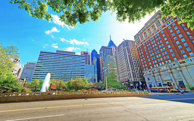 Love Park and Penn Center with skyline of skyscrapers