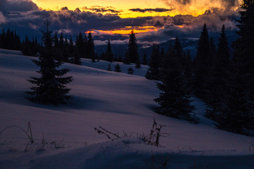 Winter landscape in the higest Carpahian mountains near Yaremche in the sunset