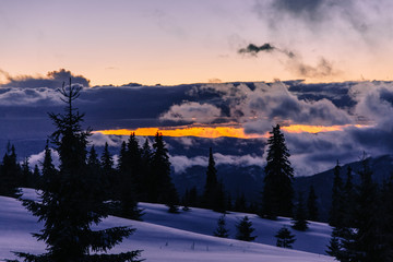 Winter landscape in the higest Carpahian mountains near Yaremche in the sunset