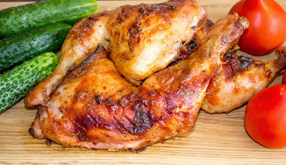 Grilled chicken with fresh tomatoes and cucumbers
