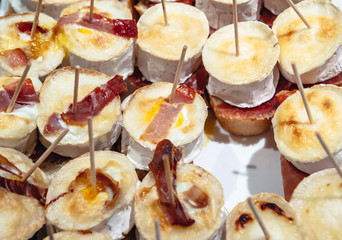 Traditional Spanish snacks called pinchos in San Sebastian city also called Donostia in Gipuzkoa region of Spain