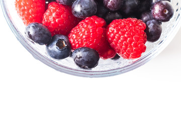 Sweet berries of raspberry and blueberry close up