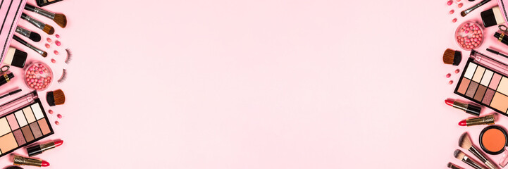 Makeup professional cosmetics on pink background.