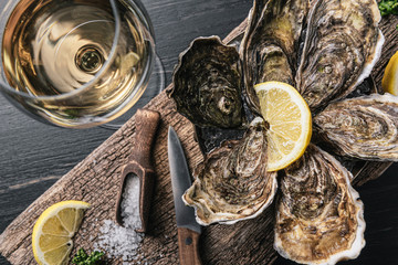 Fresh oysters with lemon ice and white wine.