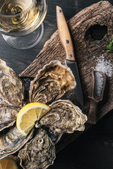 Fresh oysters with lemon ice and white wine.