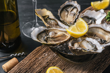 Fresh oysters with lemon ice and white wine.