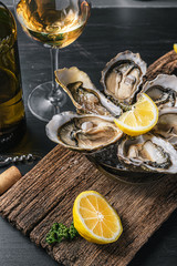 Fresh oysters with lemon ice and white wine.