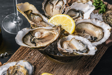 Fresh oysters with lemon ice and white wine.