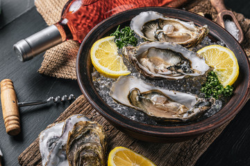 Fresh oysters with lemon ice and white wine.