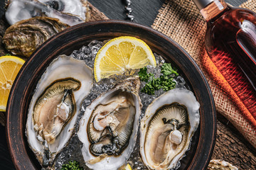 Fresh oysters with lemon ice and white wine.