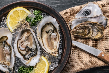 Fresh oysters with lemon ice and white wine.