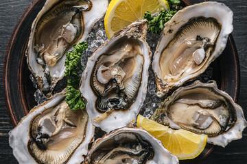 Fresh oysters with lemon ice and white wine.