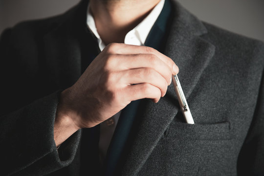 business man hand pen on suit pocket