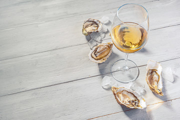 Fresh oysters with lemon ice and white wine.