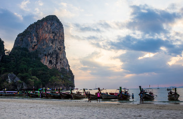 Long tail boats in Koh Lanta Thailand at sunset