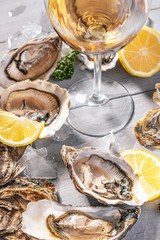 Fresh oysters with lemon ice and white wine.