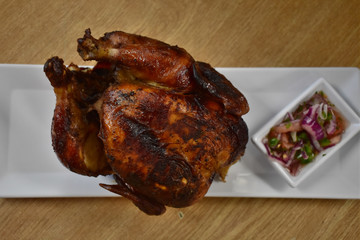 A Shot of a Rotisserie Chicken from the Side