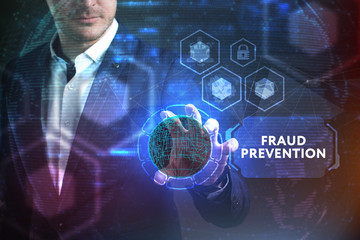 Business, Technology, Internet and network concept. Young businessman working on a virtual screen of the future and sees the inscription: Fraud prevention
