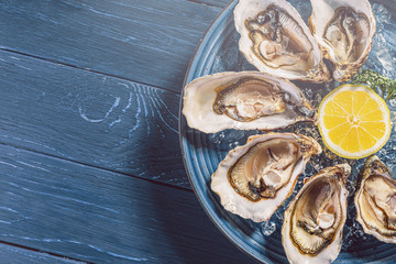 Fresh oysters with lemon ice and white wine.