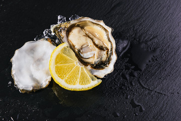 Fresh oysters with lemon ice and white wine.